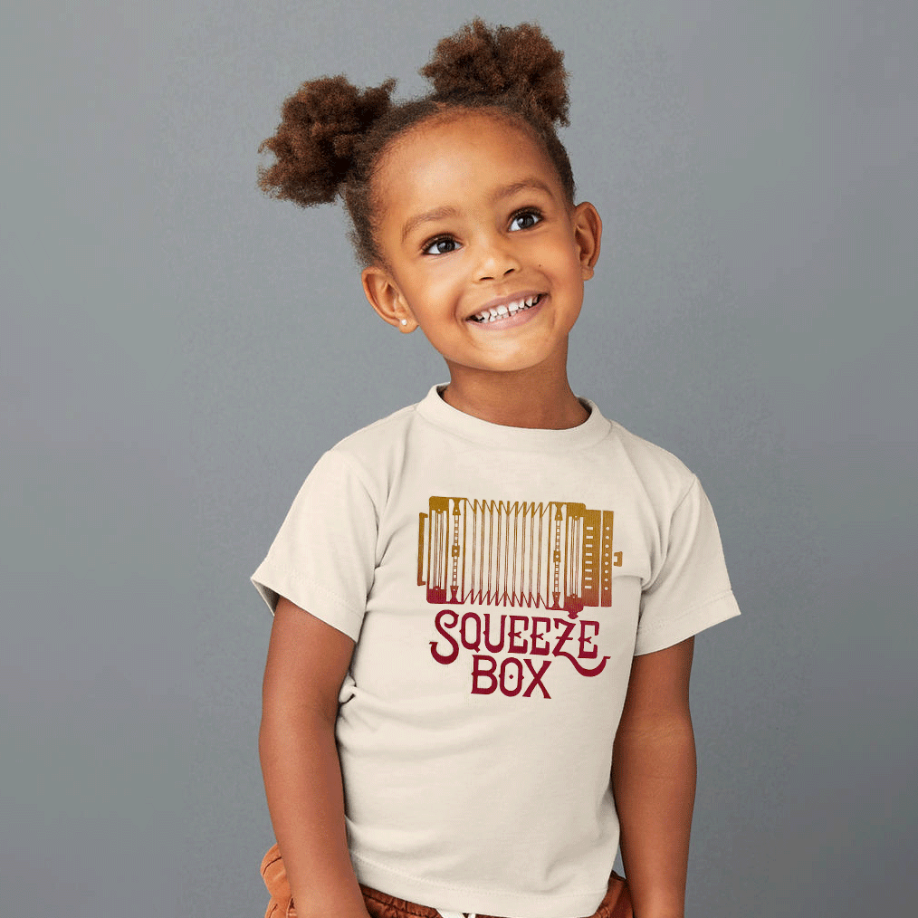 Girl wearing Squeezebox Toddler tee shirt